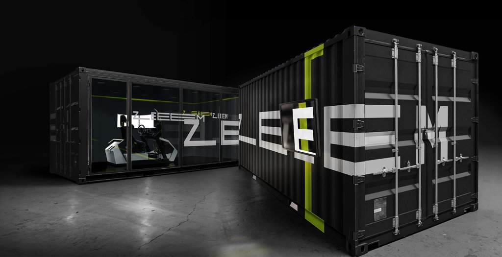 Moderner und individualisierter Schiffscontainer mit eingebautem Rennsimulator-Setup, in stilvollem Design für ein immersives Erlebnis.